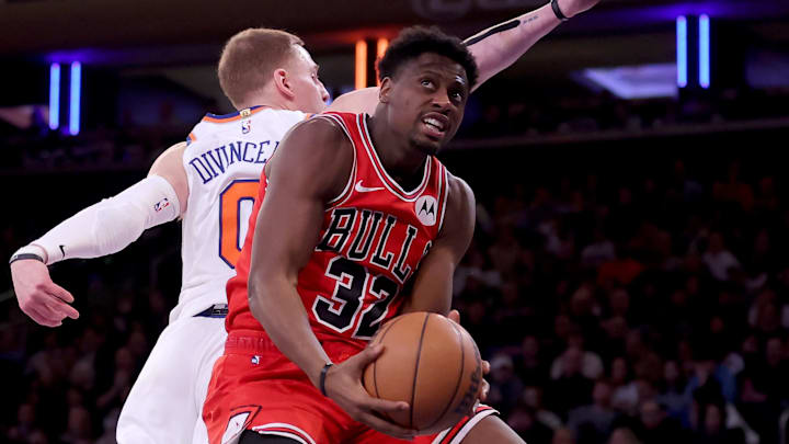 Jan 3, 2024; New York, New York, USA; Chicago Bulls forward Terry Taylor (32) drives to the basket against New York Knicks guard Donte DiVincenzo (0) during the third quarter at Madison Square Garden. Mandatory Credit: Brad Penner-Imagn Images