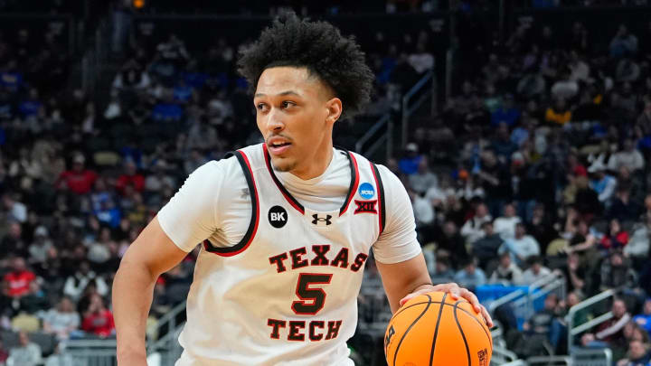 Mar 21, 2024; Pittsburgh, PA, USA; Texas Tech Red Raiders guard Darrion Williams (5) dribbles the ball against the Texas Tech Red Raiders during the first half at PPG Paints Arena. Mandatory Credit: Gregory Fisher-USA TODAY Sports