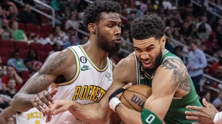 Mar 13, 2023; Houston, Texas, USA; Boston Celtics forward Jayson Tatum (0) moves to the net against Houston Rockets forward Tari Eason (17) in the third quarter at Toyota Center. Mandatory Credit: Thomas Shea-USA TODAY Sports