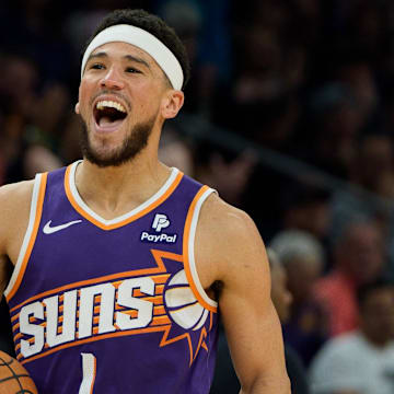 Apr 7, 2024; Phoenix, Arizona, USA;  Phoenix Suns guard Devin Booker (1) reacts after stealing the ball against the New Orleans Pelicans in the second half at Footprint Center. Mandatory Credit: Allan Henry-Imagn Images