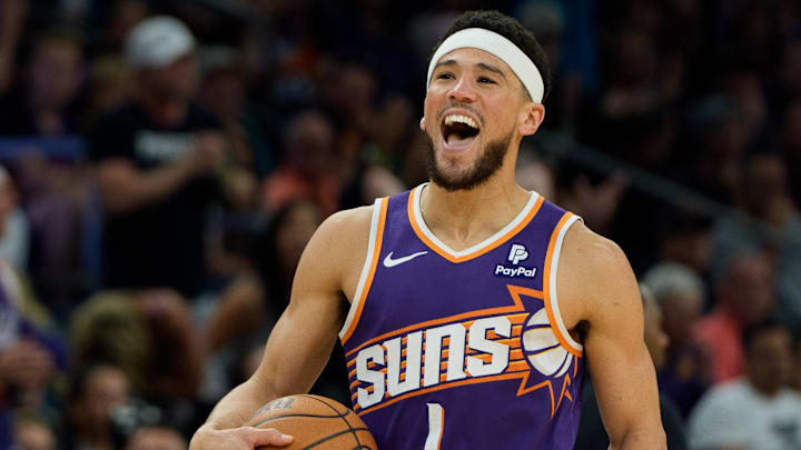 Apr 7, 2024; Phoenix, Arizona, USA;  Phoenix Suns guard Devin Booker (1) reacts after stealing the ball against the New Orleans Pelicans in the second half at Footprint Center. Mandatory Credit: Allan Henry-Imagn Images