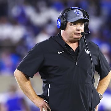 Sep 14, 2024; Lexington, Kentucky, USA; Kentucky Wildcats head coach Mark Stoops looks on during the first quarter against the Georgia Bulldogs at Kroger Field. Mandatory Credit: Carter Skaggs-Imagn Images