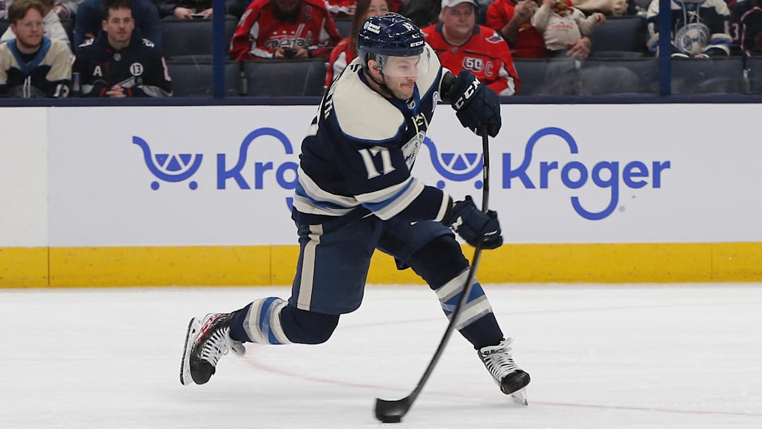 Apr 12, 2025; Columbus, Ohio, USA; Columbus Blue Jackets right wing Justin Danforth (17) wrists a shot on goal aWashington Capitals  during the third period at Nationwide Arena. Mandatory Credit: Russell LaBounty-Imagn Images