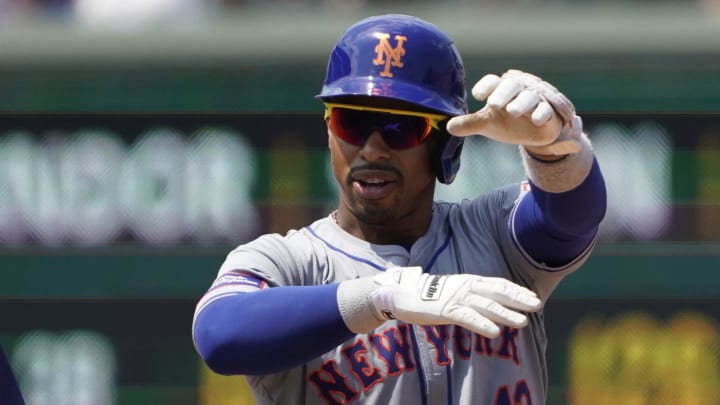 Jun 21, 2024; Chicago, Illinois, USA; New York Mets shortstop Francisco Lindor (12) gestures after hitting a double against the Chicago Cubs during the fourth inning at Wrigley Field. Mandatory Credit: David Banks-USA TODAY Sports