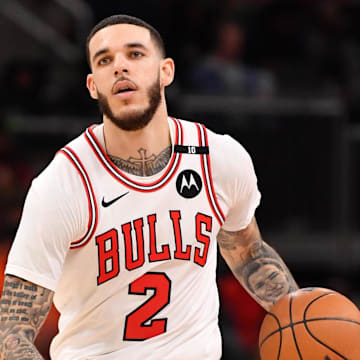 Feb 28, 2025; Chicago, Illinois, USA; Chicago Bulls guard Lonzo Ball (2) controls the ball during a game against the Toronto Raptors at the United Center. Mandatory Credit: Patrick Gorski-Imagn Images