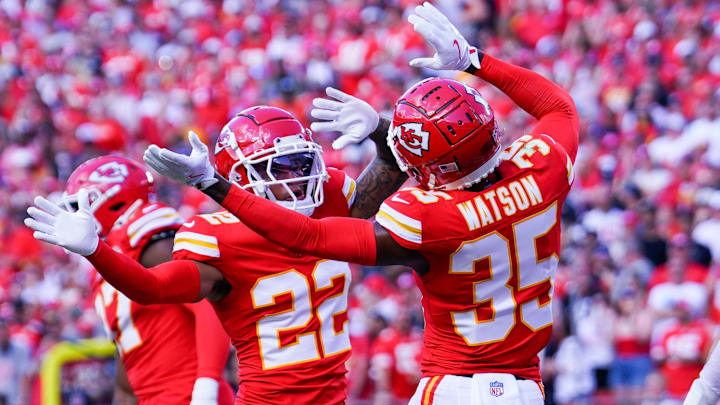 Sep 15, 2024; Kansas City, Missouri, USA; Kansas City Chiefs cornerback Trent McDuffie (22) celebrates with cornerback Jaylen Watson (35) after a play against the Cincinnati Bengals during the first half at GEHA Field at Arrowhead Stadium. Mandatory Credit: Denny Medley-Imagn Images