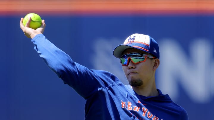 Jun 1, 2024; New York City, New York, USA; New York Mets injured starting pitcher Kodai Senga (34) throws a softball in the outfield before a game against the Arizona Diamondbacks at Citi Field. Mandatory Credit: Brad Penner-USA TODAY Sports