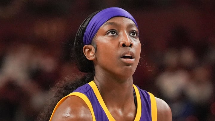 Mar 10, 2024; Greensville, SC, USA; LSU Lady Tigers guard Flau'jae Johnson (4) during the first half against the South Carolina Gamecocks at Bon Secours Wellness Arena. Mandatory Credit: Jim Dedmon-USA TODAY Sports