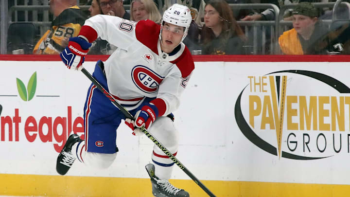 Nov 2, 2024; Pittsburgh, Pennsylvania, USA;  Montreal Canadiens left wing Juraj Slafkovsky (20) skates up ice with the puck against the Pittsburgh Penguins during the second period at PPG Paints Arena. Mandatory Credit: Charles LeClaire-Imagn Images