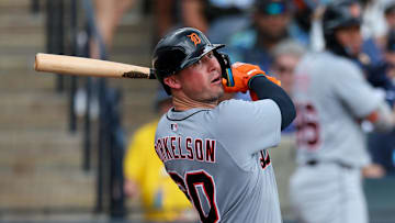 Jun 22, 2025; Tampa, Florida, USA; Detroit Tigers first baseman Spencer Torkelson (20) hits an rbi double against the Tampa Bay Rays in the ninth inning at George M. Steinbrenner Field. 