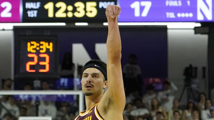 Mar 9, 2024; Evanston, Illinois, USA; Minnesota Golden Gophers forward Dawson Garcia (3) makes a three point basket against the Northwestern Wildcats during the first half at Welsh-Ryan Arena. Mandatory Credit: David Banks-Imagn Images