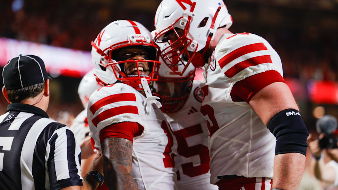 Wide receiver Nyziah Hunter (left) celebrates with teammates after his touchdown reception late in the first half against Cincinnati. Wide receiver Nyziah Hunter (left) celebrates with teammates after his touchdown reception late in the first half against Cincinnati.