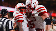 Nebraska wide receiver Nyziah Hunter (left) celebrates his touchdown catch late in the second quarter.