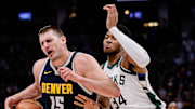 Jan 29, 2024; Denver, Colorado, USA; Denver Nuggets center Nikola Jokic (15) controls the ball against Milwaukee Bucks forward Giannis Antetokounmpo (34) in the third quarter at Ball Arena. Mandatory Credit: Isaiah J. Downing-Imagn Images