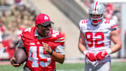 Apr 15, 2023; Columbus, Ohio, United States;  Ohio State Buckeyes alumni Archie Griffin runs the ball down the field during the third quarter of the Ohio State Buckeyes spring game at Ohio Stadium on Saturday morning. Mandatory Credit: Joseph Scheller-The Columbus Dispatch

Football Ceb Osufb Spring Game Ohio State At Ohio State