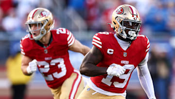 San Francisco 49ers running back Christian McCaffrey (L) and wide receiver Deebo Samuel (R)