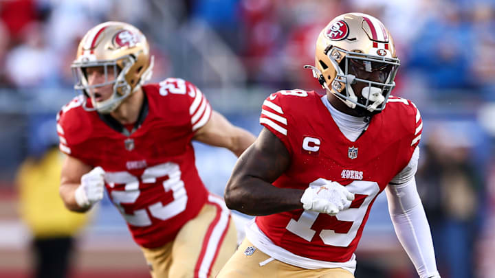 San Francisco 49ers running back Christian McCaffrey (L) and wide receiver Deebo Samuel (R)