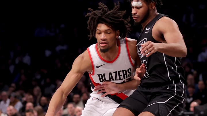 Jan 7, 2024; Brooklyn, New York, USA; Portland Trail Blazers guard Shaedon Sharpe (17) controls the ball against Brooklyn Nets guard Cam Thomas (24) during the second quarter at Barclays Center. Mandatory Credit: Brad Penner-USA TODAY Sports