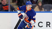Nov 7, 2025; Elmont, New York, USA; New York Islanders defenseman Matthew Schaefer (48) skates with the puck against the Minnesota Wild during the third period at UBS Arena. Mandatory Credit: Brad Penner-Imagn Images