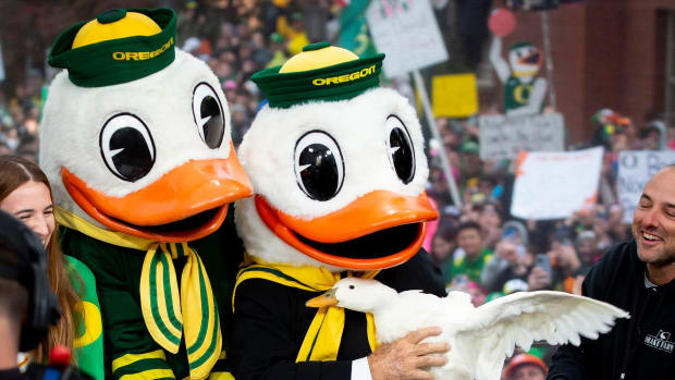 Nov. 22, 2022: Lee Corso holds a duck alongside The Duck after picking the Ducks as the winner of Saturday's top-10 matchup