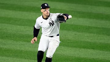 Oct 30, 2024; New York, New York, USA; New York Yankees outfielder Aaron Judge (99) makes a fielding error during the fifth inning against the Los Angeles Dodgers in game five of the 2024 MLB World Series at Yankee Stadium. Mandatory Credit: Wendell Cruz-Imagn Images