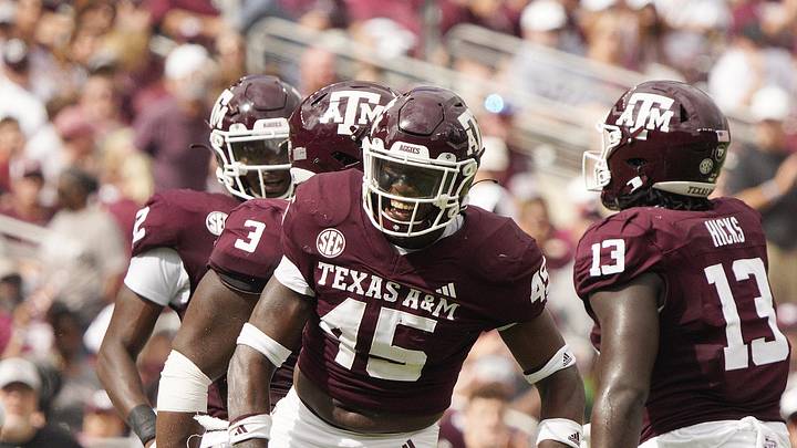 Oct 28, 2023; College Station, Texas, USA; Texas A&M Aggies linebacker Edgerrin Cooper (45) celebrates a tackle against the South Carolina Gamecocks during the second quarter at Kyle Field. Mandatory Credit: Dustin Safranek-Imagn Images