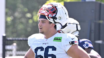 Jul 28, 2025; Foxborough, MA, USA; New England Patriots offensive tackle Will Campbell (66) takes a break during warm-ups  at training camp at Gillette Stadium. Mandatory Credit: Eric Canha-Imagn Images
