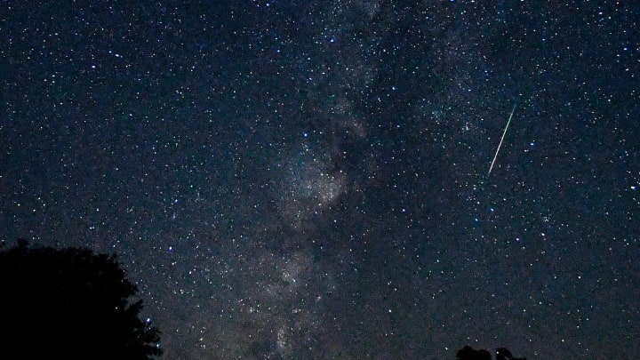 A meteor is caught as a blurred line in this eight-second exposure of the Milky Way over Abilene State Park Saturday August 12, 2023. Meteors from the Perseid Meteor Shower increased in frequency after midnight.