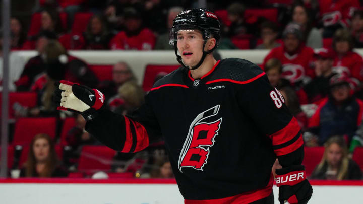 Jan 21, 2024; Raleigh, North Carolina, USA;  Carolina Hurricanes center Martin Necas (88) reacts against the Minnesota Wild during the second period at PNC Arena. Mandatory Credit: James Guillory-USA TODAY Sports