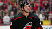 Mar 6, 2025; Raleigh, North Carolina, USA;  Carolina Hurricanes right wing Mikko Rantanen (96) looks on during the warmups before the game against the Boston Bruins at Lenovo Center. Mandatory Credit: James Guillory-Imagn Images