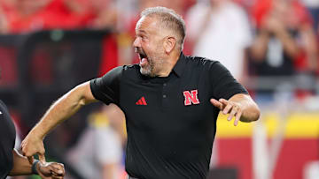 Nebraska coach Matt Rhule leads the team onto the field at Arrowhead Stadium before the game against Cincinnati.