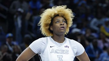Aug 25, 2025; Chicago, Illinois, USA; Chicago Sky center Kamilla Cardoso (10) looks on next to Las Vegas Aces forward NaLyssa Smith (3) during the first half at Wintrust Arena. Mandatory Credit: Kamil Krzaczynski-Imagn Images