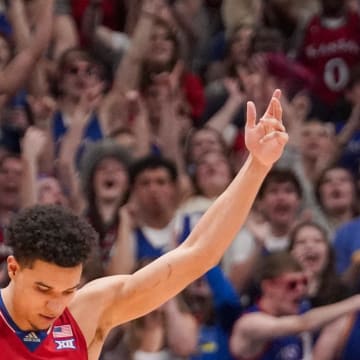 Mar 5, 2024; Lawrence, Kansas, USA; Kansas Jayhawks guard Kevin McCullar Jr. (15) celebrates against the Kansas State Wildcats at a time out during the second half at Allen Fieldhouse. Mandatory Credit: Denny Medley-USA TODAY Sports