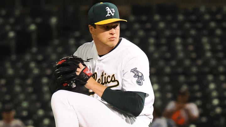 Jul 22, 2024; Oakland, California, USA; Oakland Athletics relief pitcher Mason Miller (19) pitches the ball against the Houston Astros during the ninth inning at Oakland-Alameda County Coliseum. Mandatory Credit: Kelley L Cox-USA TODAY Sports