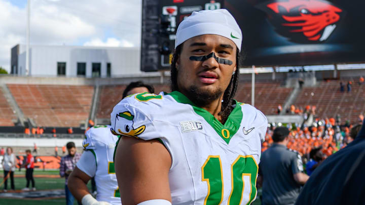 Sep 14, 2024; Corvallis, Oregon, USA; Oregon Ducks offensive lineman Iapani Laloulu (72) and Oregon Ducks defensive end Matayo Uiagalelei (10) leave the field after the game against the Oregon State Beavers at Reser Stadium. Mandatory Credit: Craig Strobeck-Imagn Images