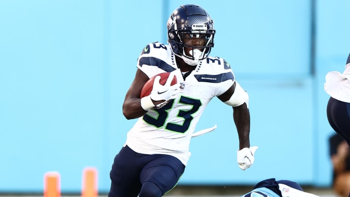 Aug 17, 2024; Nashville, Tennessee, USA; Seattle Seahawks wide receiver Dee Williams (33) runs the ball down the sideline in the first quarter of the game against the Tennessee Titans at Nissan Stadium. Mandatory Credit: Casey Gower-USA TODAY Sports