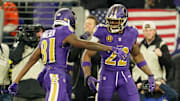 Nov 27, 2025; Baltimore, Maryland, USA; Baltimore Ravens running back Derrick Henry (22) reacts after scoring a touchdown against the Cincinnati Bengals during the first half at M&T Bank Stadium. Mandatory Credit: Mitch Stringer-Imagn Images