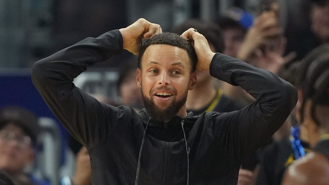 Jan 2, 2026; San Francisco, California, USA; Golden State Warriors guard Stephen Curry (center) reacts after a foul call against center Al Horford (not shown) during the first quarter against the Oklahoma City Thunder at Chase Center. Mandatory Credit: Darren Yamashita-Imagn Images