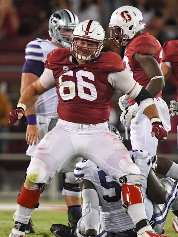 Stanford Cardinal defensive tackle Harrison Phillips (66) celebrates a defensive stop against the Kansas State Wildcats.