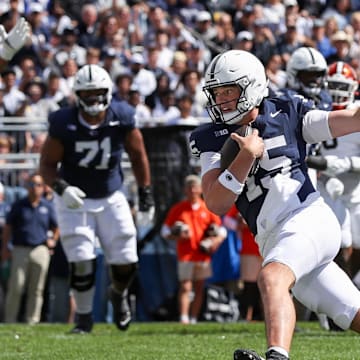 Penn State quarterback Drew Allar rushes for a touchdown during the first quarter against the Bowling Green Falcons at Beaver Stadium. 