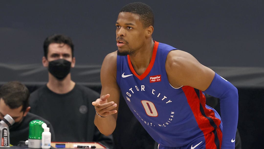 Former  Detroit Pistons guard Dennis Smith Jr. (0) points as he makes a three-point basket against the Toronto Raptors during the first half at Amalie Arena.