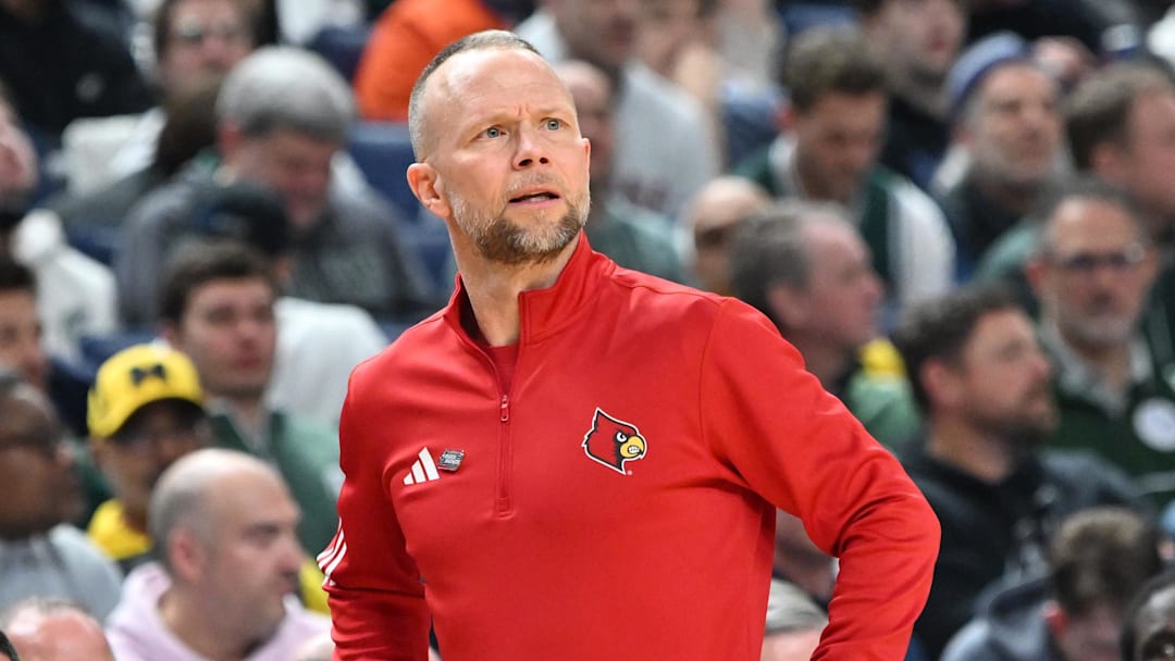 Mar 21, 2026; Buffalo, NY, USA; Louisville Cardinals head coach Pat Kelsey looks on during the first half against the Michigan State Spartans during a second round game of the men's 2026 NCAA Tournament at Keybank Center. Mandatory Credit: Mark Konezny-Imagn Images