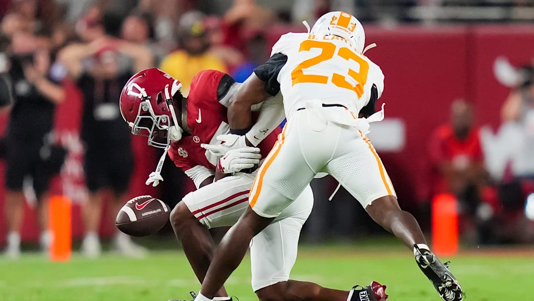 Alabama wide receiver Lotzeir Brooks (17) drops a pass while defended by Tennessee defensive back Boo Carter (23) during a college football game between Tennessee and Alabama at Bryant-Denny Stadium in Tuscaloosa, Ala., on Oct. 18, 2025.