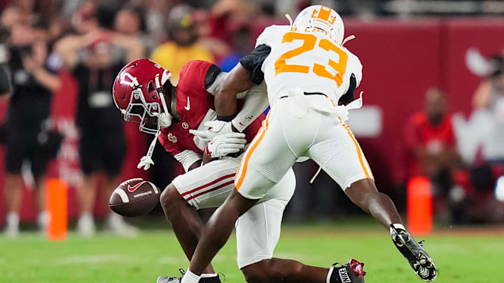 Alabama wide receiver Lotzeir Brooks (17) drops a pass while defended by Tennessee defensive back Boo Carter (23) during a college football game between Tennessee and Alabama at Bryant-Denny Stadium in Tuscaloosa, Ala., on Oct. 18, 2025.