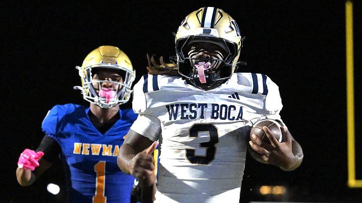 West Boca Raton's Javian Mallory crosses the finish line to score during a 26-20 overtime loss to Cardinal Newman on Oct. 17, 2025.