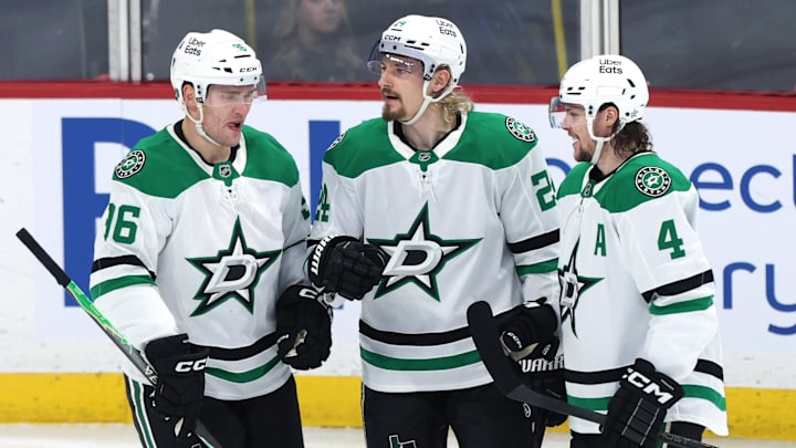 Dec 9, 2025; Winnipeg, Manitoba, CAN; Dallas Stars center Roope Hintz (24) celebrates his goal against the Winnipeg Jets  Mikko Rantanen (96) and Miro Heiskanen (4) in the second period at Canada Life Centre. Mandatory Credit: James Carey Lauder-Imagn Images