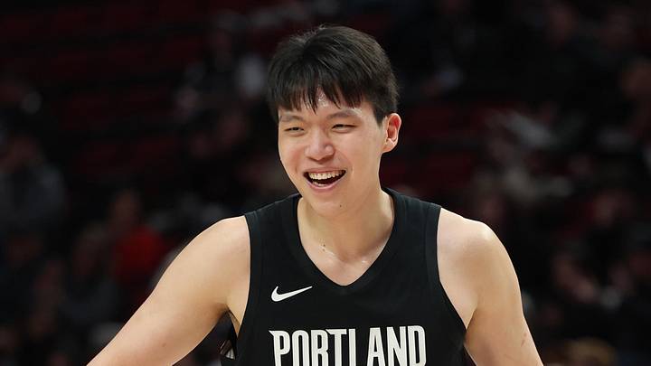 Mar 23, 2026; Portland, Oregon, USA; Portland Trail Blazers center Yang Hansen (16) reacts after scoring against the Brooklyn Nets during the second half at Moda Center. Mandatory Credit: Jaime Valdez-Imagn Images