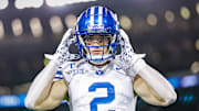 BYU wide receiver Chase Roberts warms up for the Cincinnati game