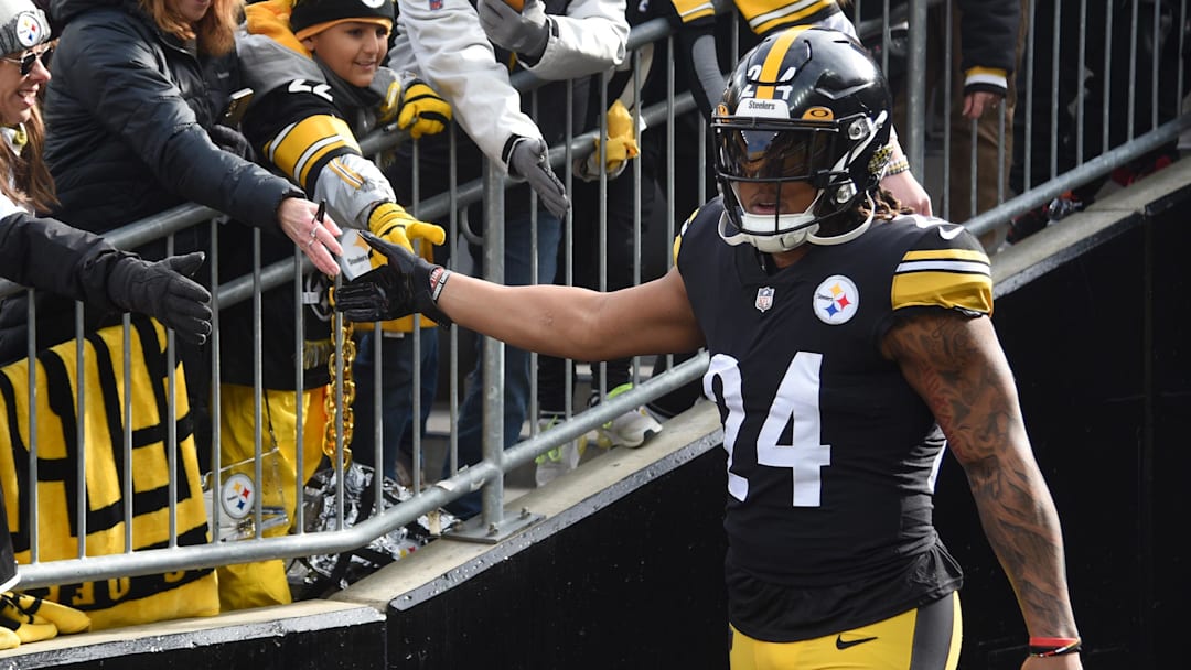 Jan 8, 2023; Pittsburgh, Pennsylvania, USA;  Pittsburgh Steelers running back Benny Snell Jr. greets fans as he makes his way to the field before playing the Cleveland Browns at Acrisure Stadium. Mandatory Credit: Philip G. Pavely-Imagn Images