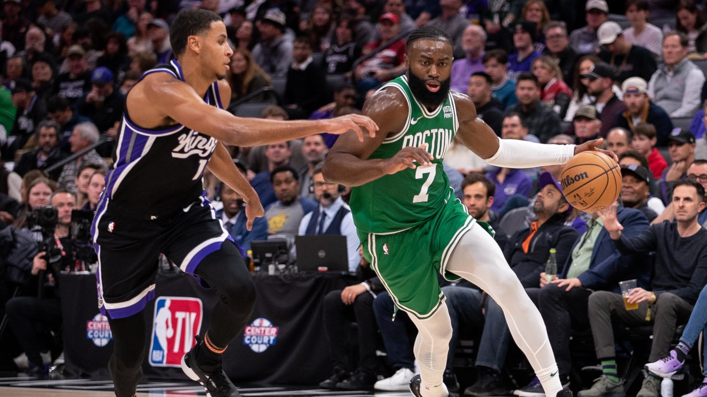 Dec 20, 2023; Sacramento, California, USA; Boston Celtics guard Jaylen Brown (7) drives to the basket vs. the Sacramento Kings.
